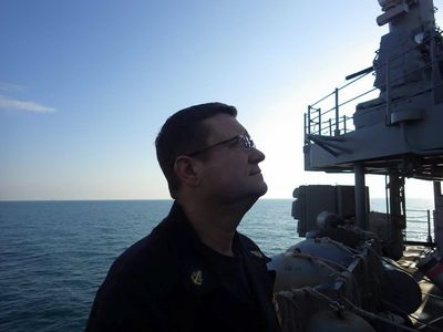 A quiet moment on the ship's deck, looking out at the ocean