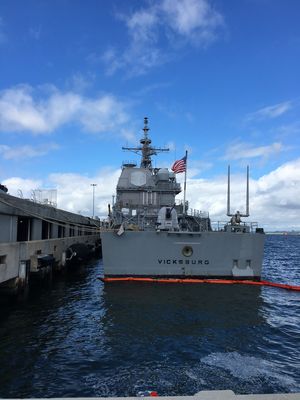 USS Vicksburg (CG-69) in port on a clear day