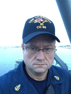Aboard USS Vicksburg (CG-69), turquoise water in the background