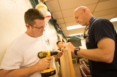 Volunteering on a hands-on community woodworking project