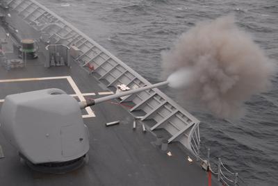 Navy CIWS gun firing during a training exercise at sea