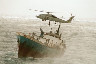 Helicopter conducting a rescue at sea
