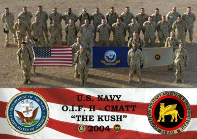 Joint team formal group photo with the American flag at CMATT, "The Kush," Iraq