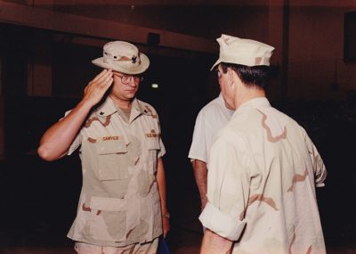 Don Sawyer's first re-enlistment ceremony in desert camouflage