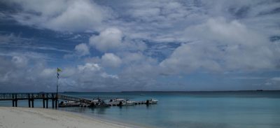 Boats moored at the pier during a port visit