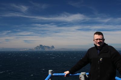 Naval vessel at sea with Gibraltar in the background